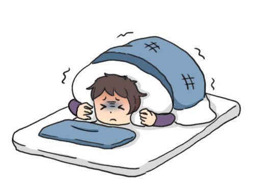 布団に入って震える人